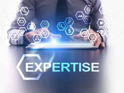 Businessman is using tablet pc and selecting expertise icon.